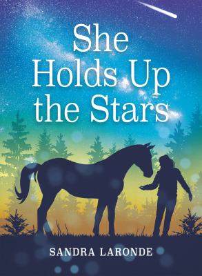 She holds up the stars cover image