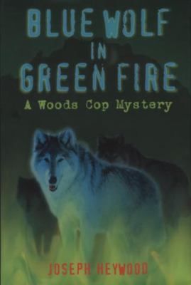 Blue wolf in green fire cover image