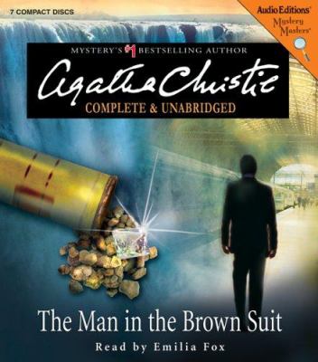 The man in the brown suit cover image