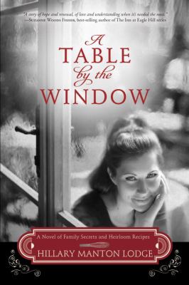 A table by the window : a novel of family secrets and heirloom recipes cover image