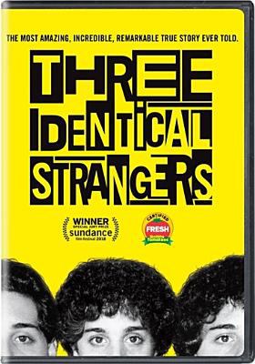 Three identical strangers cover image