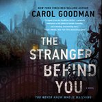 The stranger behind you : a novel cover image cdn