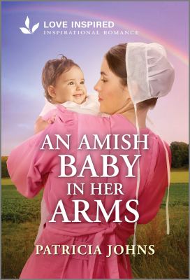 An Amish baby in her arms  cover image cdn