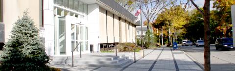 Photo of library front door and sidewalk